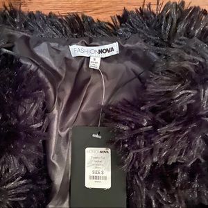 Black faux fur coat